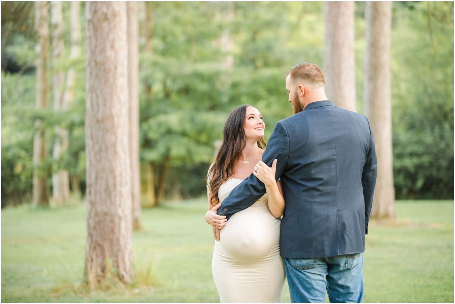 Couple in woods for maternity pictures at North Park in Pittsburgh