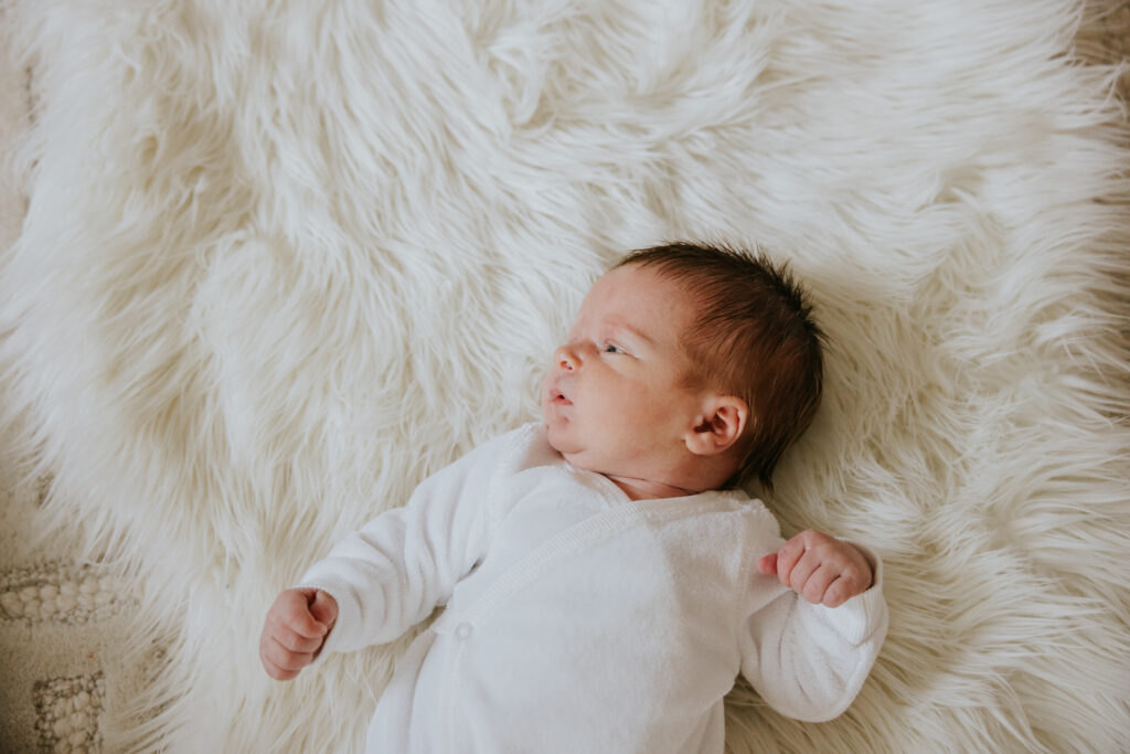 baby on fur rug | Pittsburgh newborn photographer