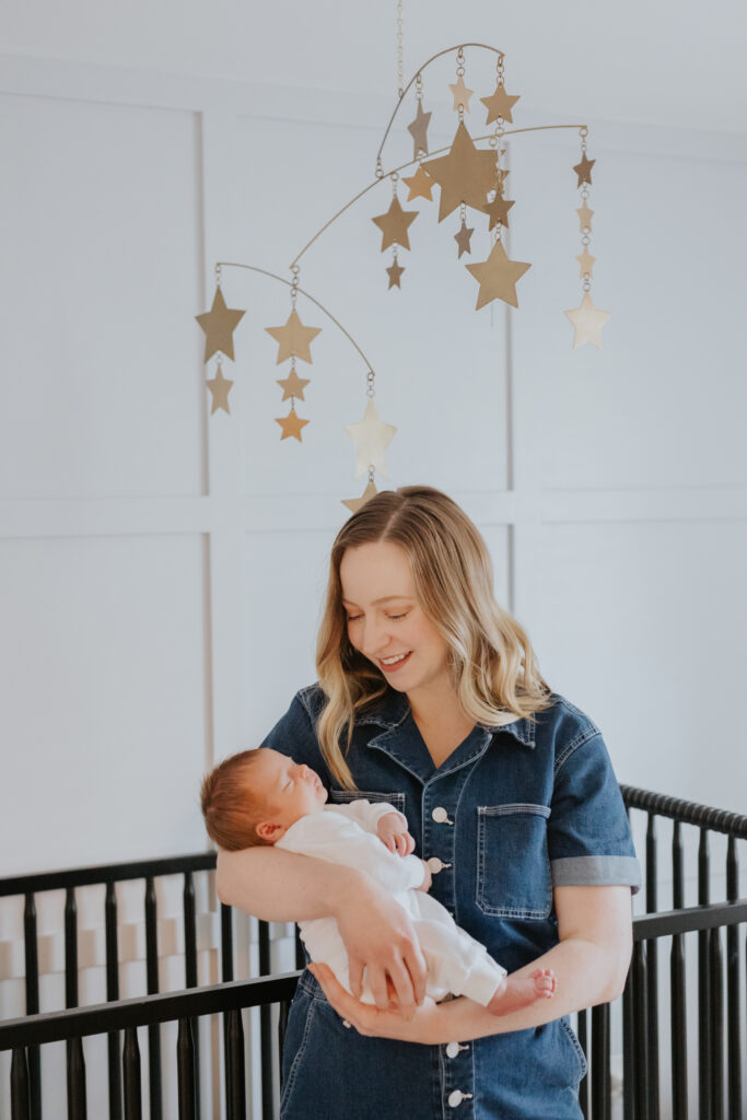 mom and newborn in nursery | Pittsburgh newborn photographer