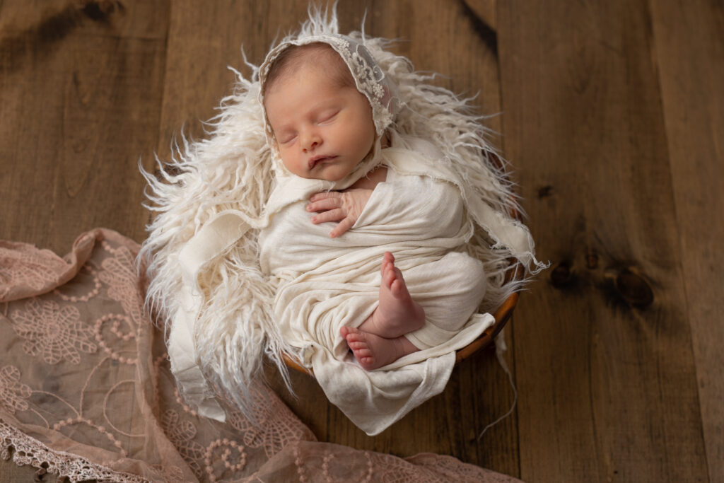 Vintage newborn studio session for baby girl in cream and pink | Kelly Adrienne Photography
