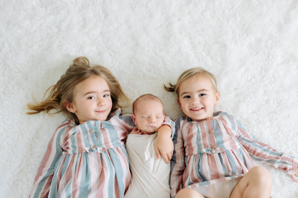 sisters and baby brother | Pittsburgh newborn photography studio 