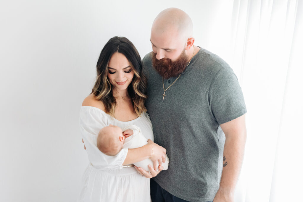 dad and mom with baby | Pittsburgh newborn photography studio 