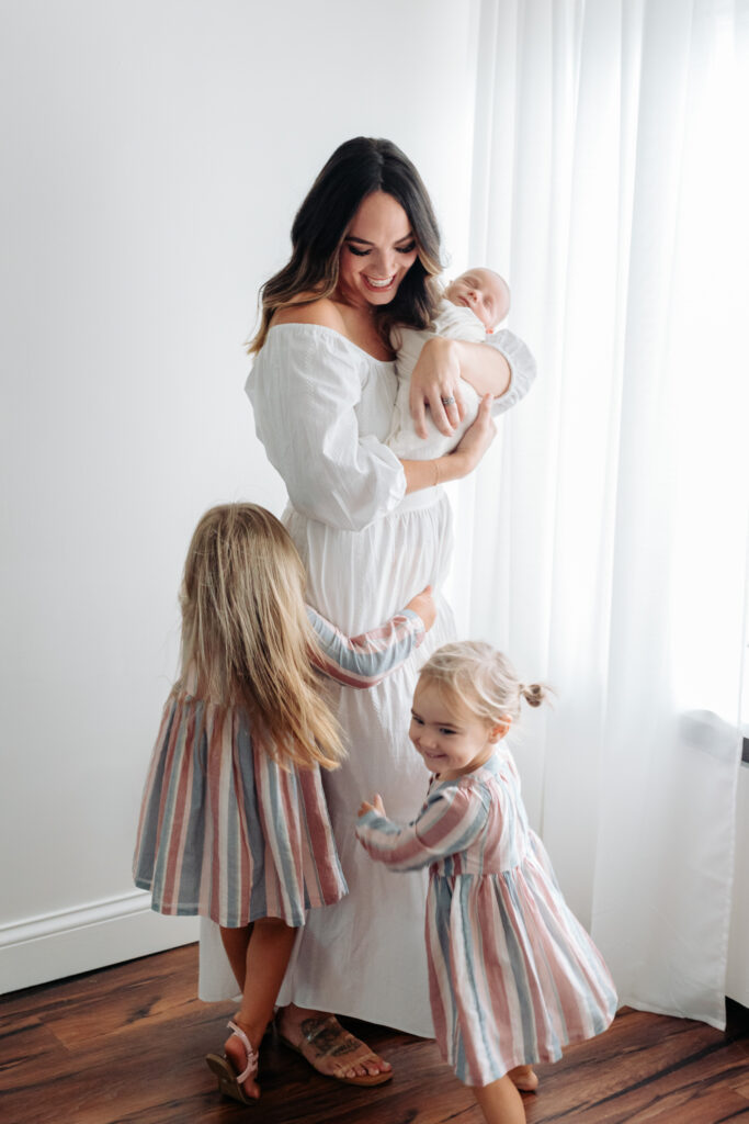 mom with girls baby | Pittsburgh newborn photography studio 