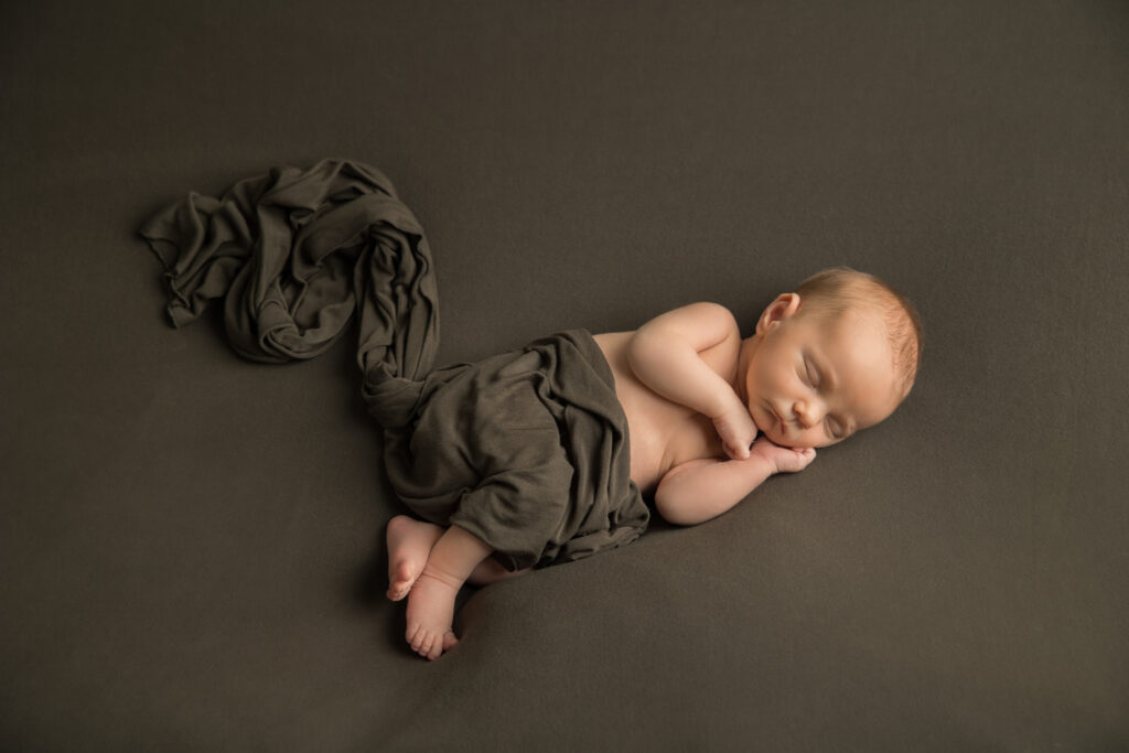 newborn baby boy on olive backdrop | Pittsburgh newborn photography studio 