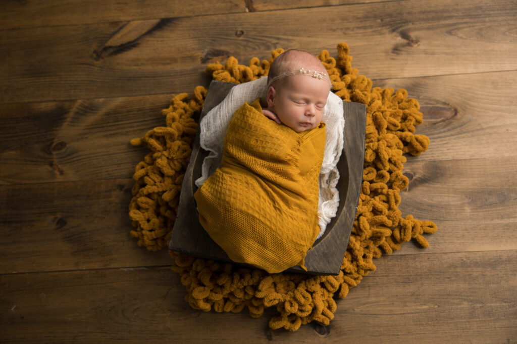 Fall newborn photography session in mustard yellow | Pittsburgh newborn photographer Kelly Adrienne Photography
