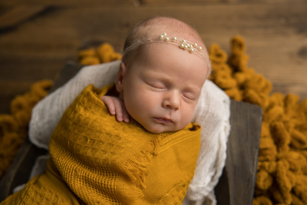 newborn girl in yellow | Kelly Adrienne Photography 
