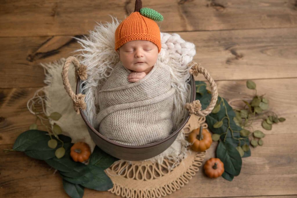 Fall newborn photos with pumpkins at Pittsburgh newborn photography studio