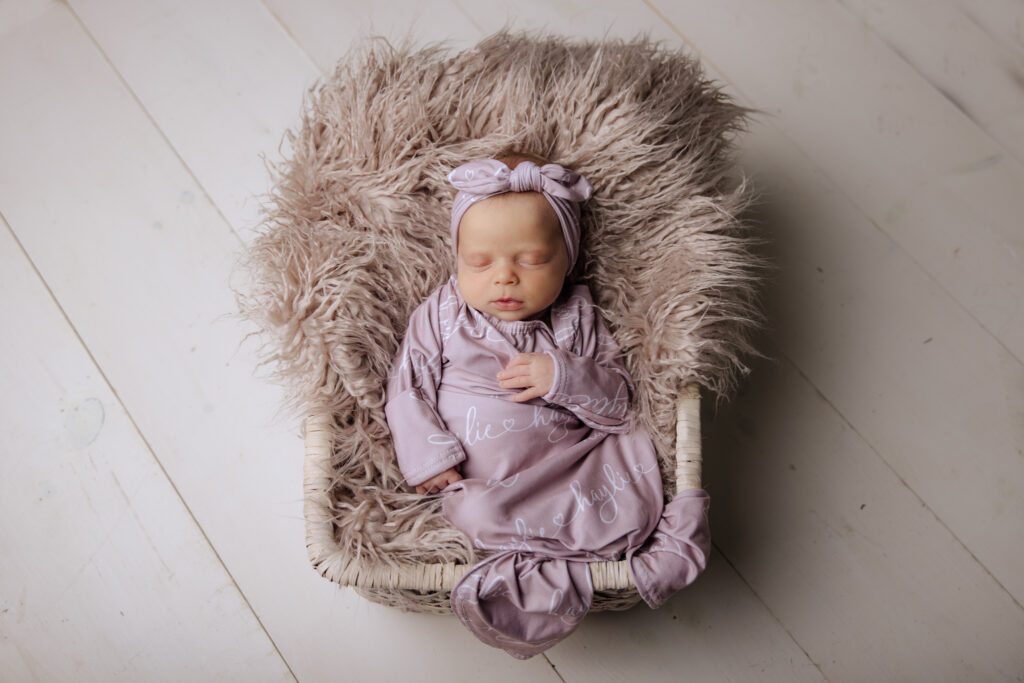 newborn girl in purple and gray | Pittsburgh newborn photographers Kelly Adrienne Photography