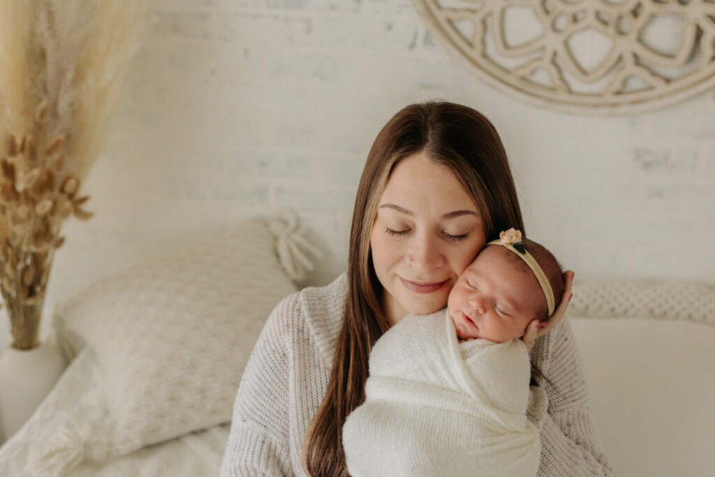 mom and baby at newborn studio | Kelly Adrienne Photography 