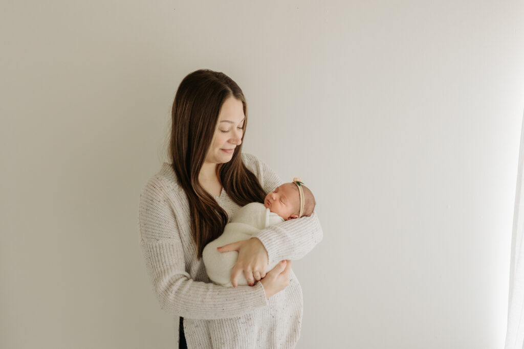 mom and baby at newborn studio | Kelly Adrienne Photography 