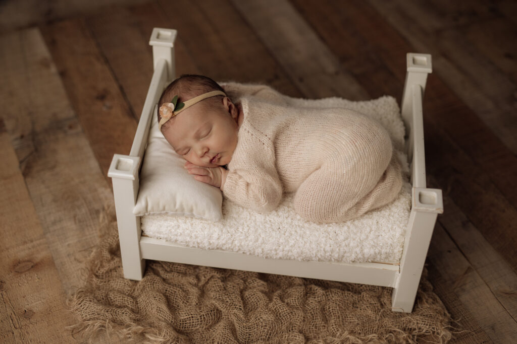 baby on bed prop newborn session | Kelly Adrienne Photography 