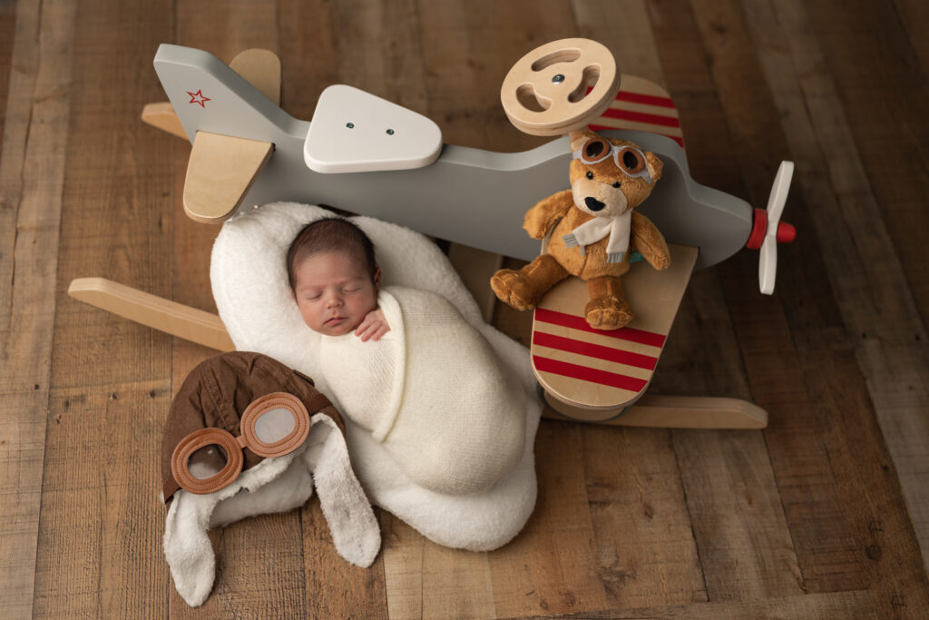 airplane newborn photoshoot | Kelly Adrienne Photography