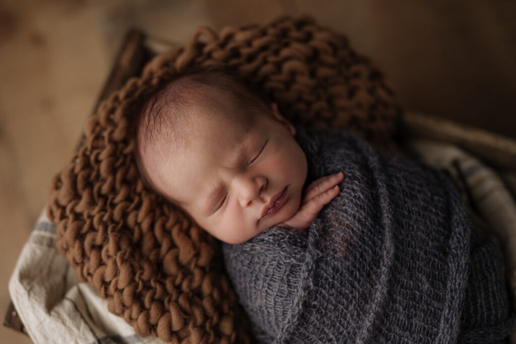 newborn baby boy wrapped in blue | Pittsburgh newborn studio