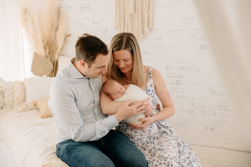 Parents and baby at boho studio family session | Kelly Adrienne Photography