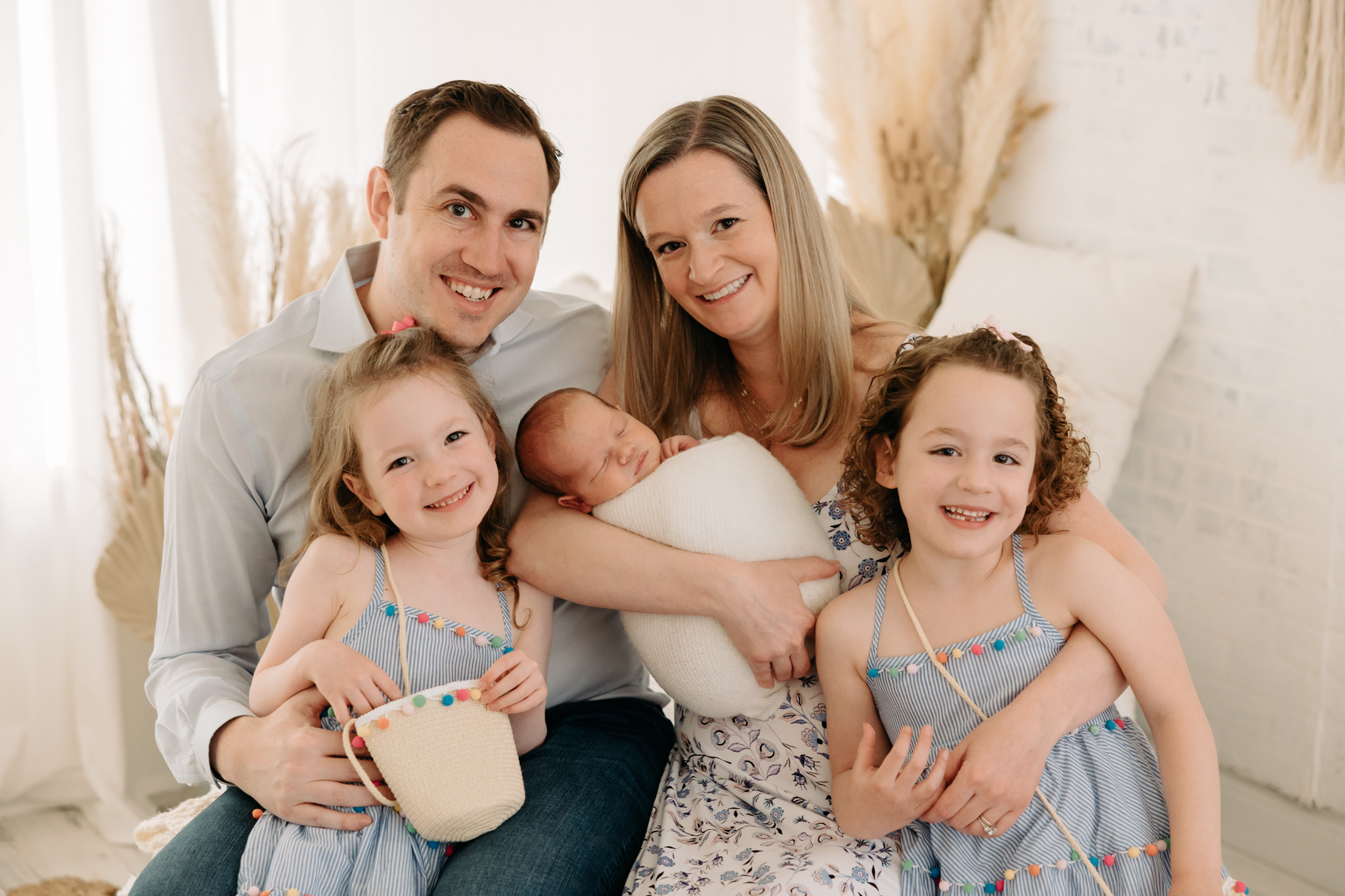 Family of five at boho studio newborn session | Kelly Adrienne Photography