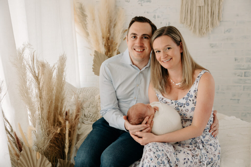 Photos of mom and dad with baby at studio session | Kelly Adrienne Photography