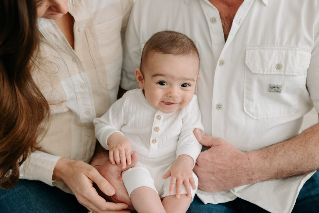 sweet 3-month-old smiles at a boho studio session