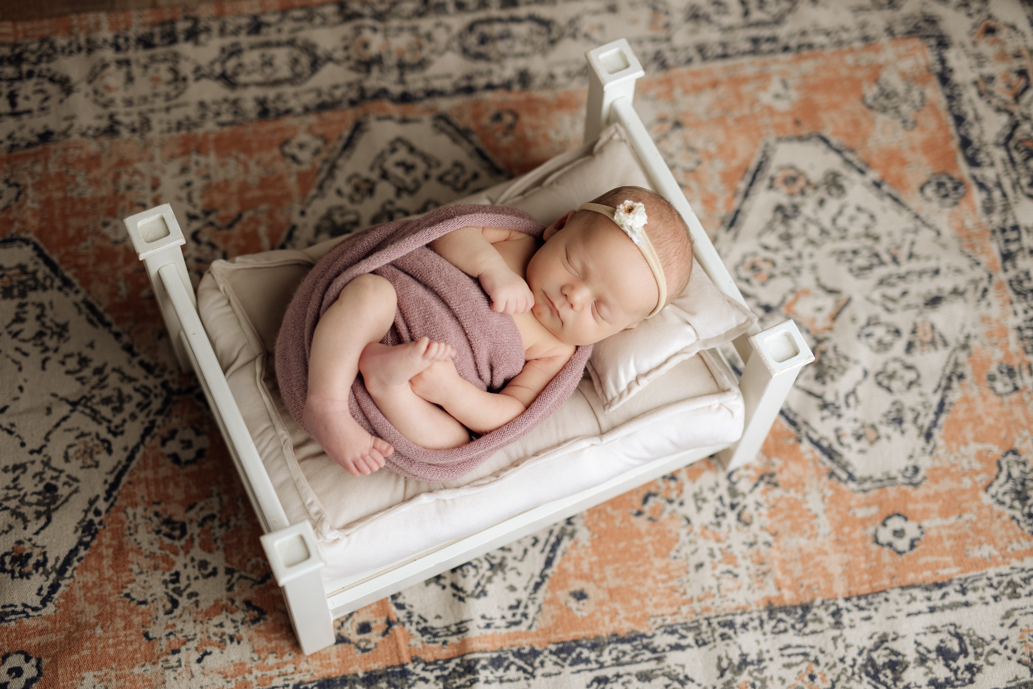 newborn girl in bed prop at newborn photo session in Pittsburgh | Kelly Adrienne Photography
