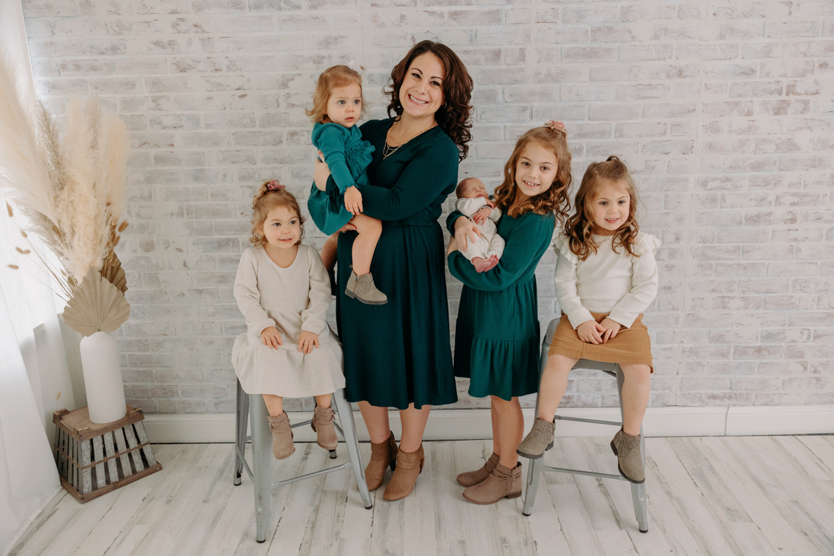 mom  with 6 kids at newborn session for large family in Pittsburgh, PA