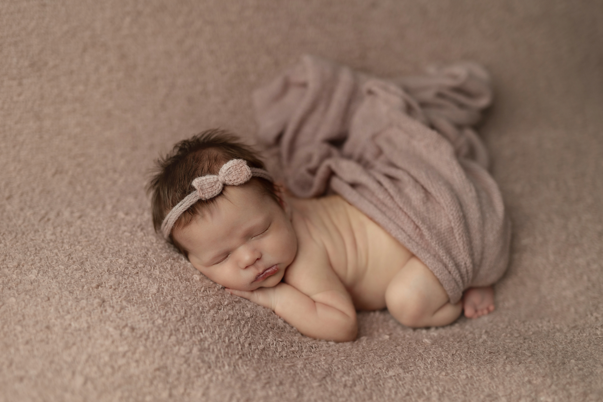 newborn girl in pink at her photo shoot in Pittsburgh