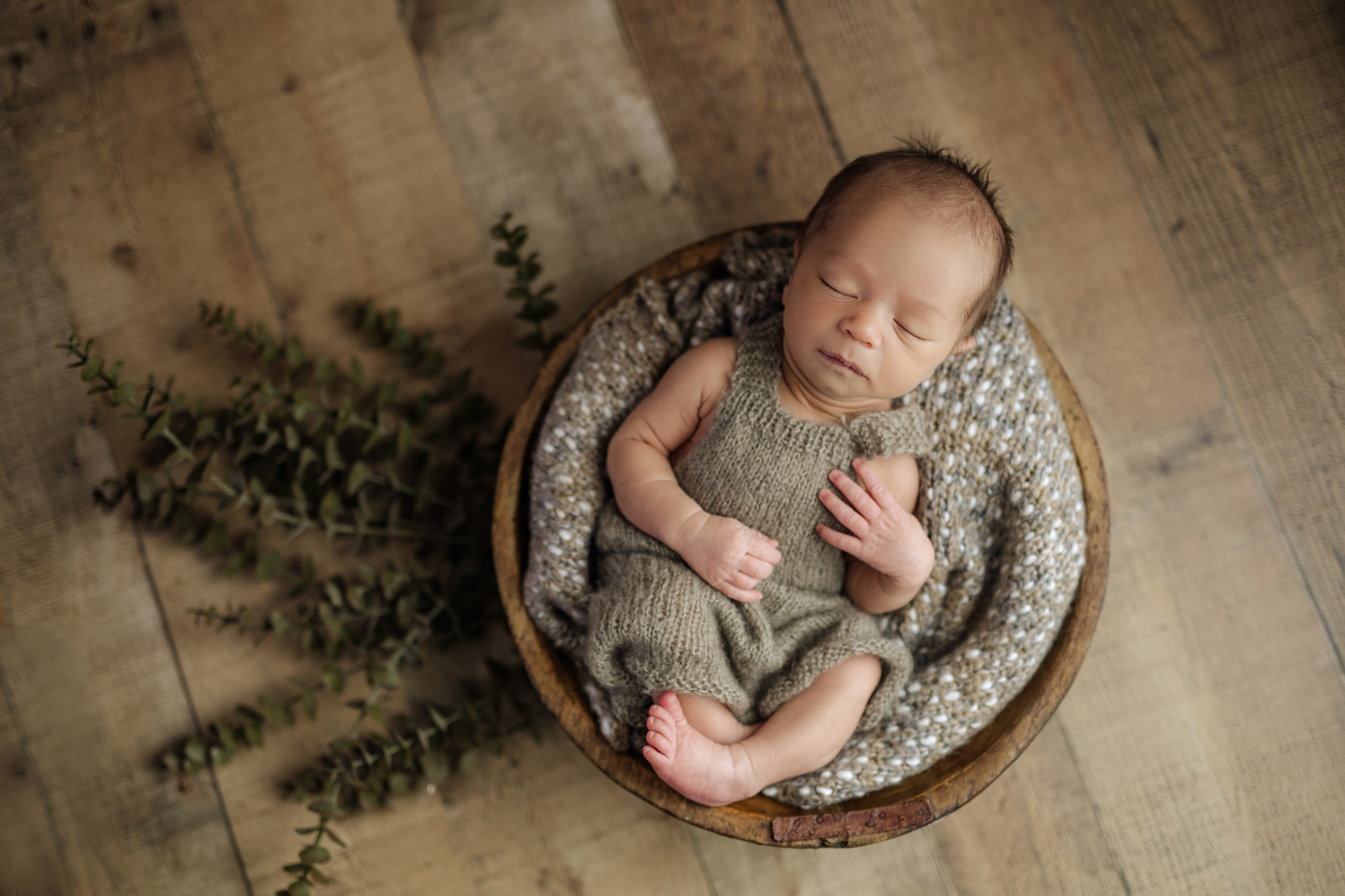 A newborn boy in neutral colors at his Pittsburgh newborn photo session