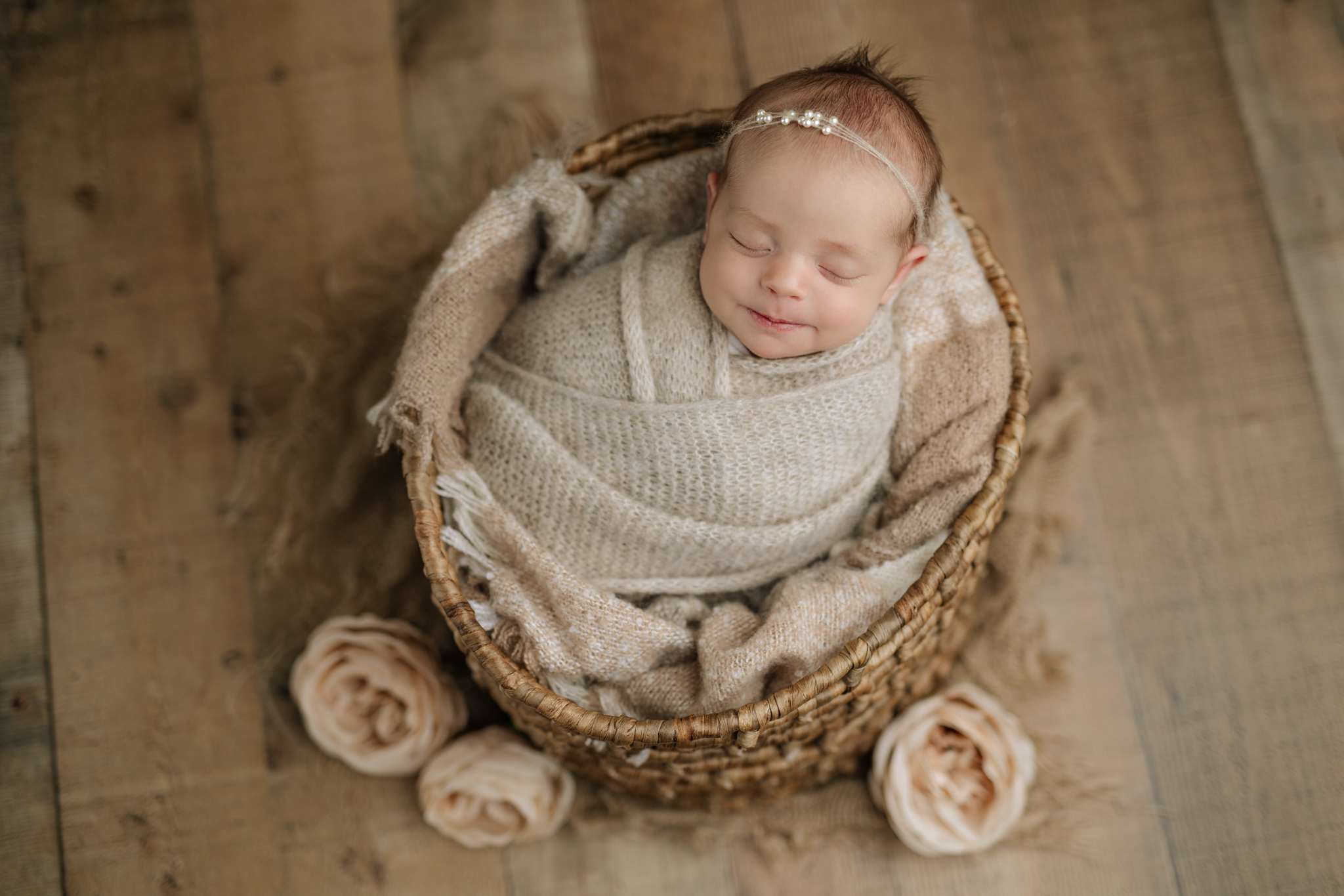 smiling newborn at photo shoot 