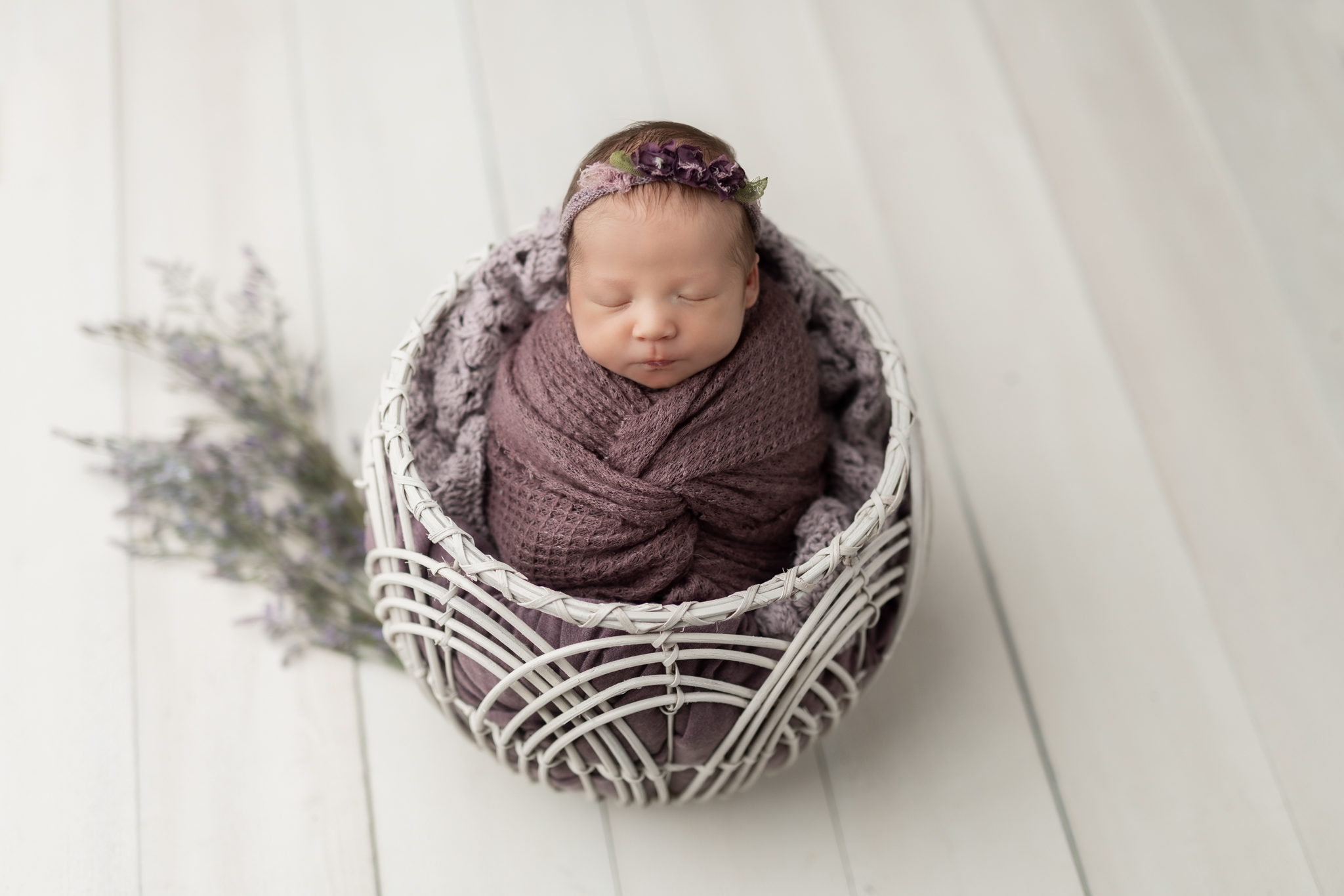 newborn posing ideas in white basket, Pittsburgh newborn photographer