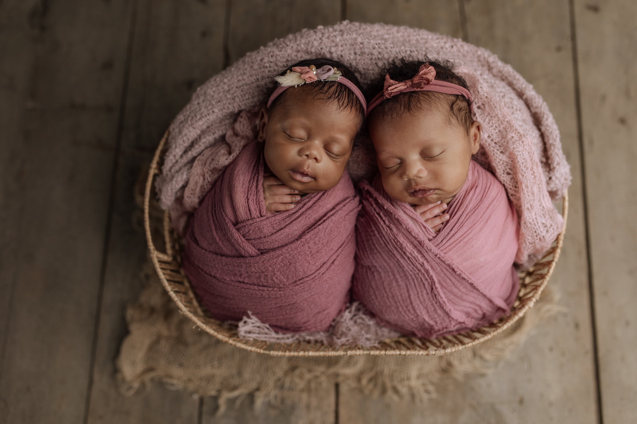 twin newborn girls in pink at Kelly Adrienne Photography