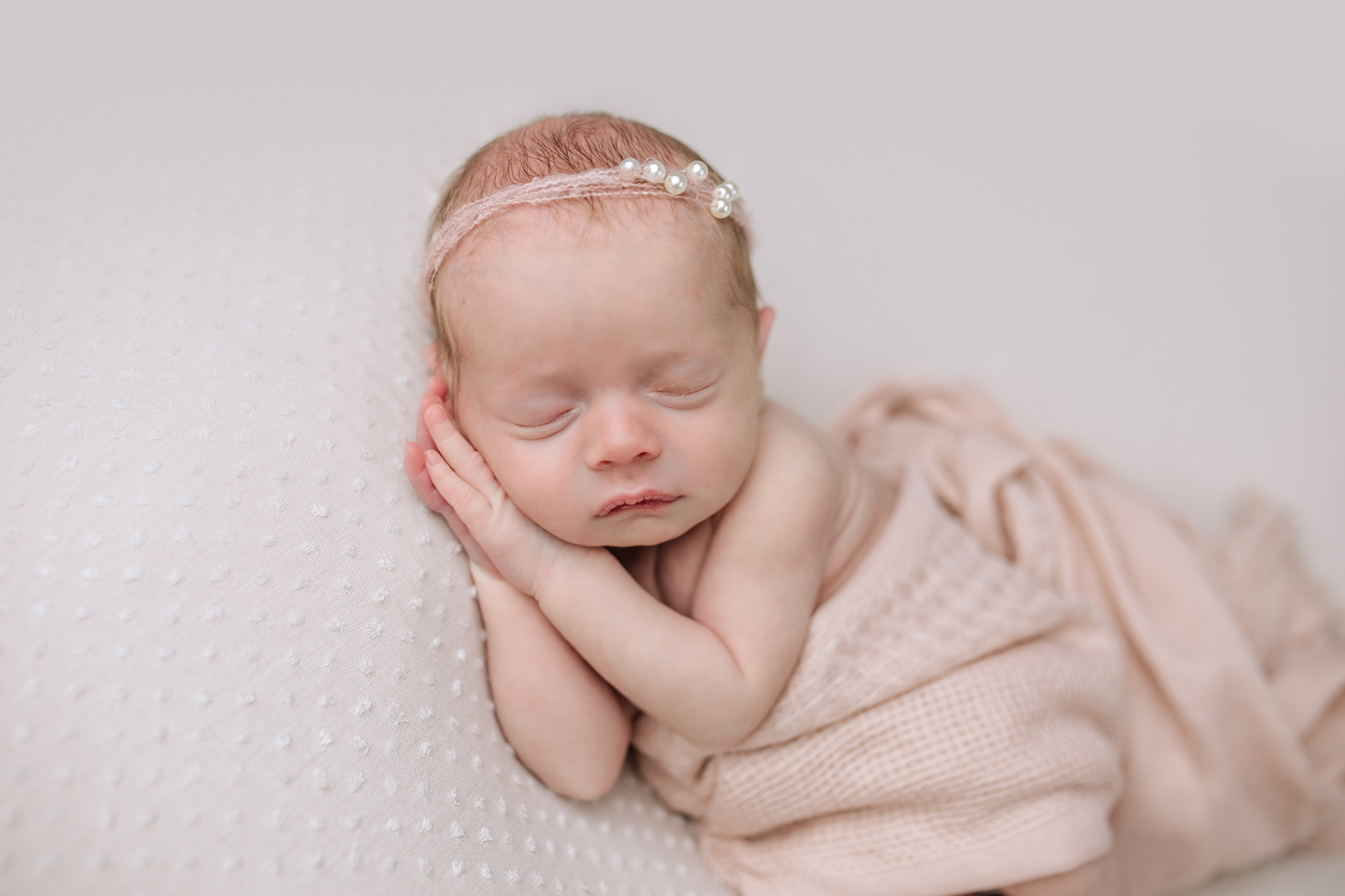 single baby pose at newborn twin session in Pittsburgh